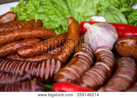 Delicious Grilled Sausages And Vegetable. Delicious Food.