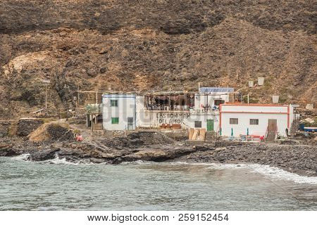 FUERTEVENTURA, SPAIN - 19 FEBRUARY 2018: Traditional fishing houses in Puertito de Los Molinos, Fuerteventura, Canary Islands, Spain.
