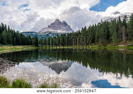 The Reflection Of The Tre Cime Di Lavaredo In Lake Antorno, In The Italian Dolomites