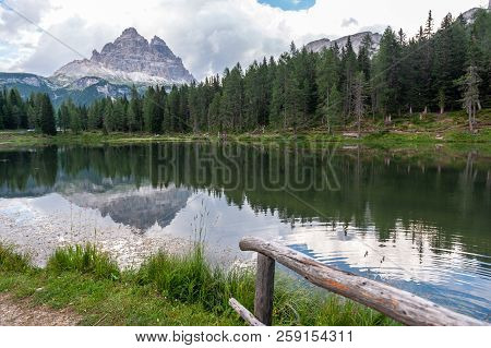 The Reflection Of The Tre Cime Di Lavaredo In Lake Antorno, In The Italian Dolomites