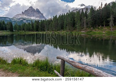 The Reflection Of The Tre Cime Di Lavaredo In Lake Antorno, In The Italian Dolomites