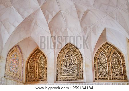 Kashan, Iran - October 22, 2017: The Rich Ornamentation In Stained-glass Windows In Central Room (sh