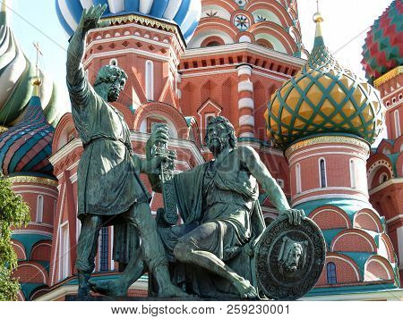 Monument To Minin And Pozharsky And St. Basil Cathedral On Red Square In Moscow. Russian Tourist Lan