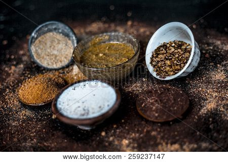 Close Up Of Face Pack Of Mung Bean Or Green Gram On Wooden Surface With Sandalwood Powder,milk,green