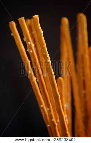 Details Of Pretzel Sticks On Black Background