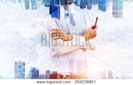Confident And Young Businessman In Smart-casual Wear Smoking Pipe And Modern Cityscape With Business