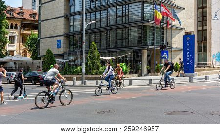 Bucharest, Romania - July 02 2018: The Pedestrians Cross Calea Victoriei Street In Downtown Buchares