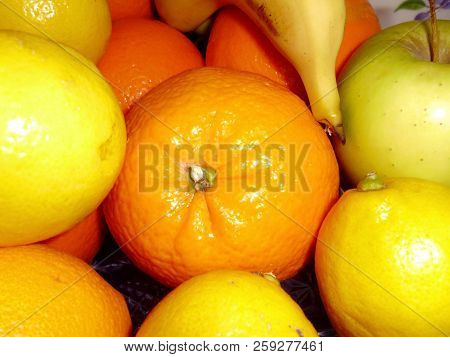 Bodegon Of Oranges, Apples, Bananas And Lemons