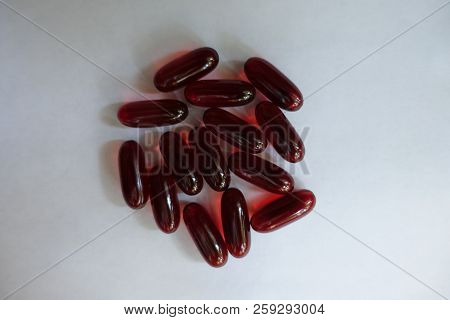 Red Softgel Capsules Of Krill Oil From Above