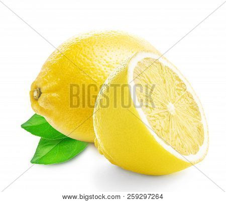 Isolated lemon. A Whole lemon fruit and sliced lemon with leaf isolated on white background