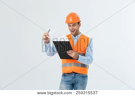 Civil Engineer Or Architech And Worker With Safety Helmet Checking Building , Engineering And Archit