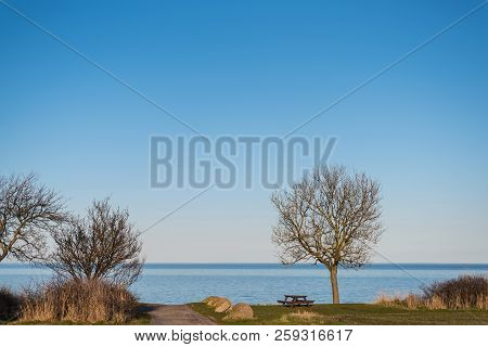 Coastal Landscape On Island Of Fehmarn, Germany Against Blue Sky And Baltic Sea