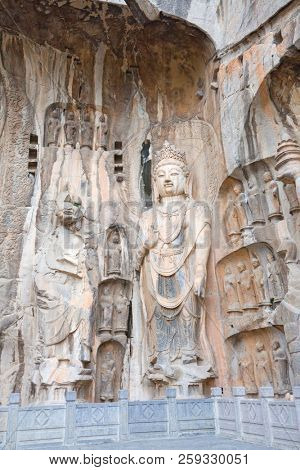Famous Longmen Grottoes (statues of Buddha and Bodhisattvas carved in the monolith rock near Luoyang in Hennn province, China)