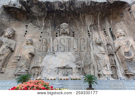Famous Longmen Grottoes (statues of Buddha and Bodhisattvas carved in the monolith rock near Luoyang in Hennn province, China)