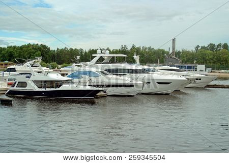 Motor Yachts Are Moored In The Harbor Of The Yacht Club On The Malaya Nevka River. Saint-petersburg.