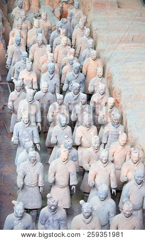 XIAN, CHINA - October 8, 2017: Famous Terracotta Army in Xi'an, China. The mausoleum of Qin Shi Huang,the first Emperor of China contains collection of terracotta sculptures of armored men and horses.