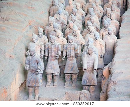 XIAN, CHINA - October 8, 2017: Famous Terracotta Army in Xi'an, China. The mausoleum of Qin Shi Huang,the first Emperor of China contains collection of terracotta sculptures of armored men and horses.