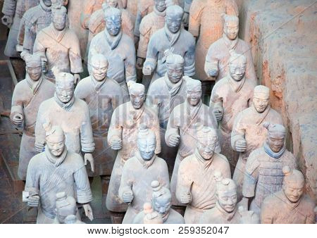 XIAN, CHINA - October 8, 2017: Famous Terracotta Army in Xi'an, China. The mausoleum of Qin Shi Huang,the first Emperor of China contains collection of terracotta sculptures of armored men and horses.