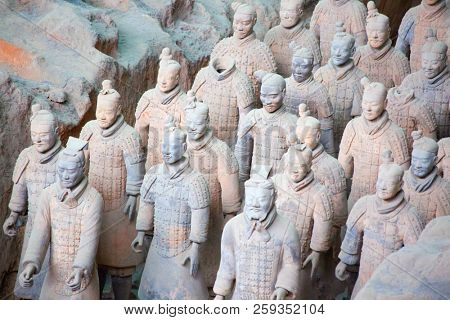 XIAN, CHINA - October 8, 2017: Famous Terracotta Army in Xi'an, China. The mausoleum of Qin Shi Huang,the first Emperor of China contains collection of terracotta sculptures of armored men and horses.