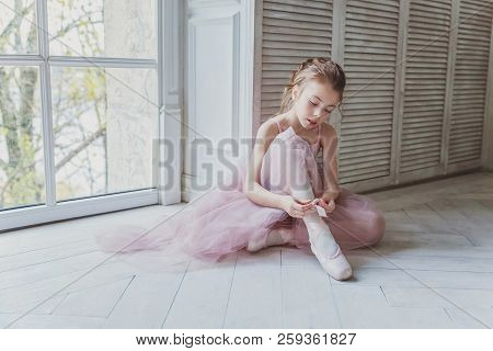 Young Classical Ballet Dancer Girl In Dance Class. Beautiful Graceful Ballerina In Pink Tutu Skirt P