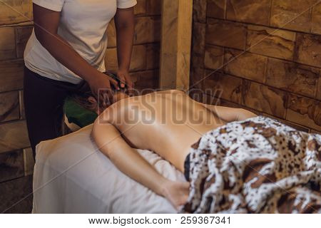 Total Relaxation. Beautiful Young Wwoman Get Balinese Or Thai Massage