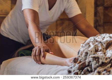 Total Relaxation. Beautiful Young Wwoman Get Balinese Or Thai Massage