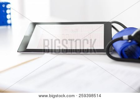 Workplace Of Doctor. Tablet Ps Showing Heart Diagrams Closeup. Healthcare And  Cardiology In Medicin