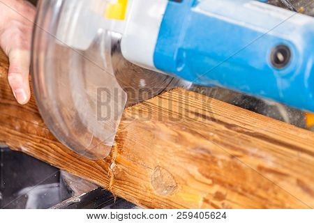 Close Up From A Buzz Saw Cuts A Wood