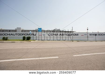 Adler, Sochi, Russia - September 6, 2018: Part of Sochi Autodrom with Back of Tribunes. Track f1 wich Located in Olympic Park in Adler. Cyrillic Text on The Wall: 
