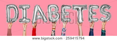 Hands showing diabates balloons word