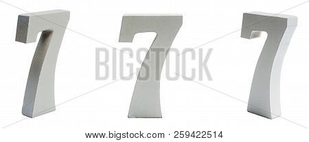 Figure Seven Made Of Plaster On A White Background At Different Angles.
