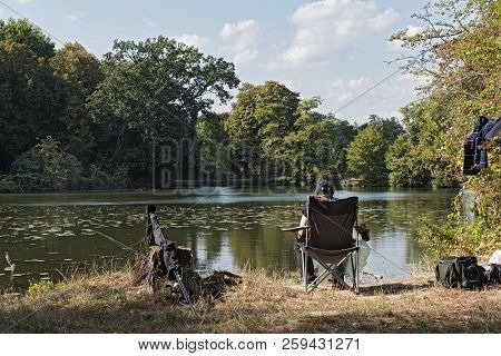 Frankfurt, Germany-september 16, 2018: Fisherman On A Lake Next To The Nidda River In Frankfurt Am M
