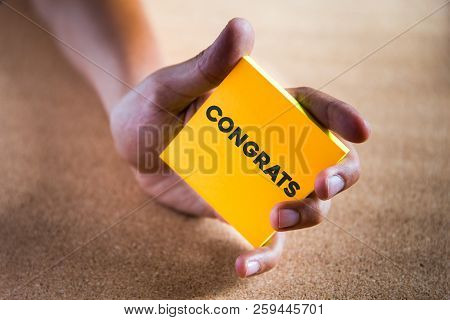 Hand Holding Note
