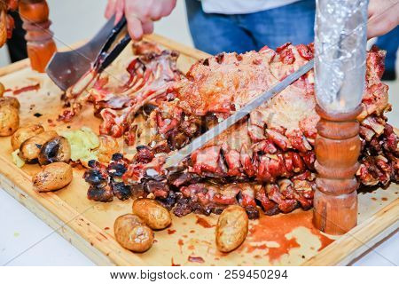 Roasted Meat Over An Open Fire, Cooked In A Special Way.barbecue Is Prepared Of Lamb Or Sheep Meat A