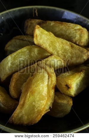 Deicious Baked Potato. Fried Crust, Close Up, Selective Focus