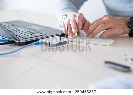 Electronic Project Of Prototyping. Student Learning Programming Of Microcontroller During His Educat