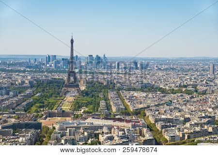 Aerial Panoramic View Of Paris Skyline With Eiffel Tower, Les Invalides And Business District Of Def