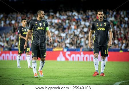 VALENCIA, SPAIN - SETEMBER 19: (L) (L) Chiellini and Bonucci during UEFA Champions League match between Valencia CF and Juventus at Mestalla Stadium on September 19, 2018 in Valencia, Spain