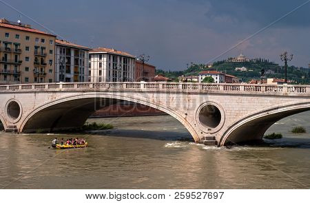 Verona, Italy - 06 May 2018: Old Historical Bridge Ponte Della Vittoria Across The Adige River In Th