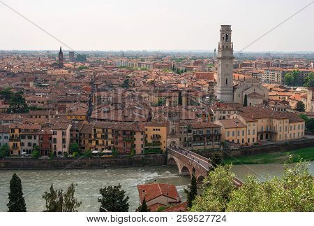 Panoramic Cityscape Of Verona, Veneto, Italy. View Of The River Adige, Ponte Pietra Bridge, Compless