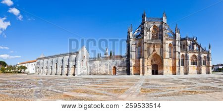Batalha, Portugal. Monastery of Batalha aka Santa Maria da Vitoria Abbey. Facade with Portal in Gothic and Manuelino aka Manueline style