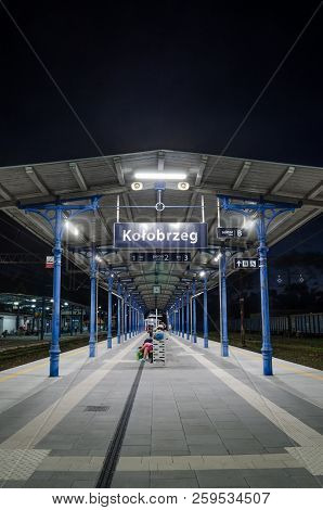 Kolobrzeg, West Pomeranian / Poland - 2018: Passengers At The Train Station Are Waiting For The Trai