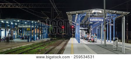 Kolobrzeg, West Pomeranian / Poland - 2018: Passengers At The Train Station Are Waiting For The Trai