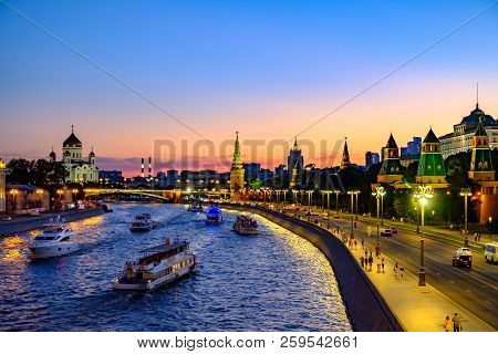 Colorful Evening Landscape On Embankment River And Moscow Kremlin.
