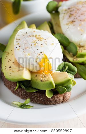 Avocado Toast, Cherry Tomato On Wooden Background. Breakfast With Toast Avocado, Vegetarian Food, He