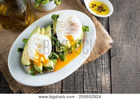 Avocado Toast, Cherry Tomato On Wooden Background. Breakfast With Toast Avocado, Vegetarian Food, He