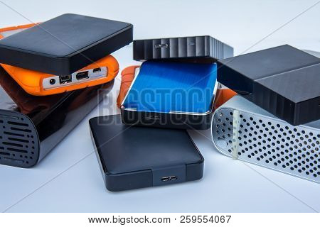 Different Kinds Of External Computer Storage Hard Drives - Isolated On White Background