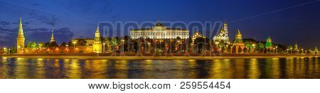 Night Panoramic View On Moscow Kremlin From River Embankment.