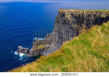 Cliffs Of Moher With Farm Field And Ocean