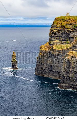 Caslte Tower And Rocks In Cliffs Of Moher